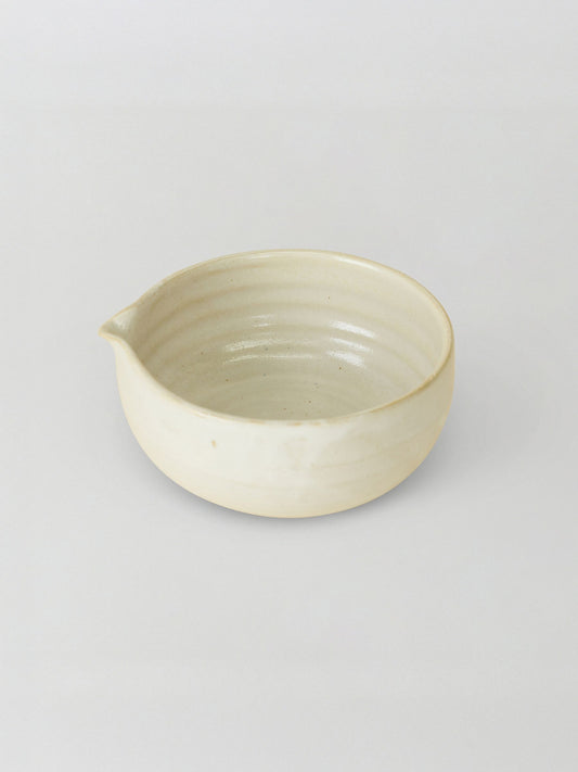 Ceramic matcha bowl on a light gray background