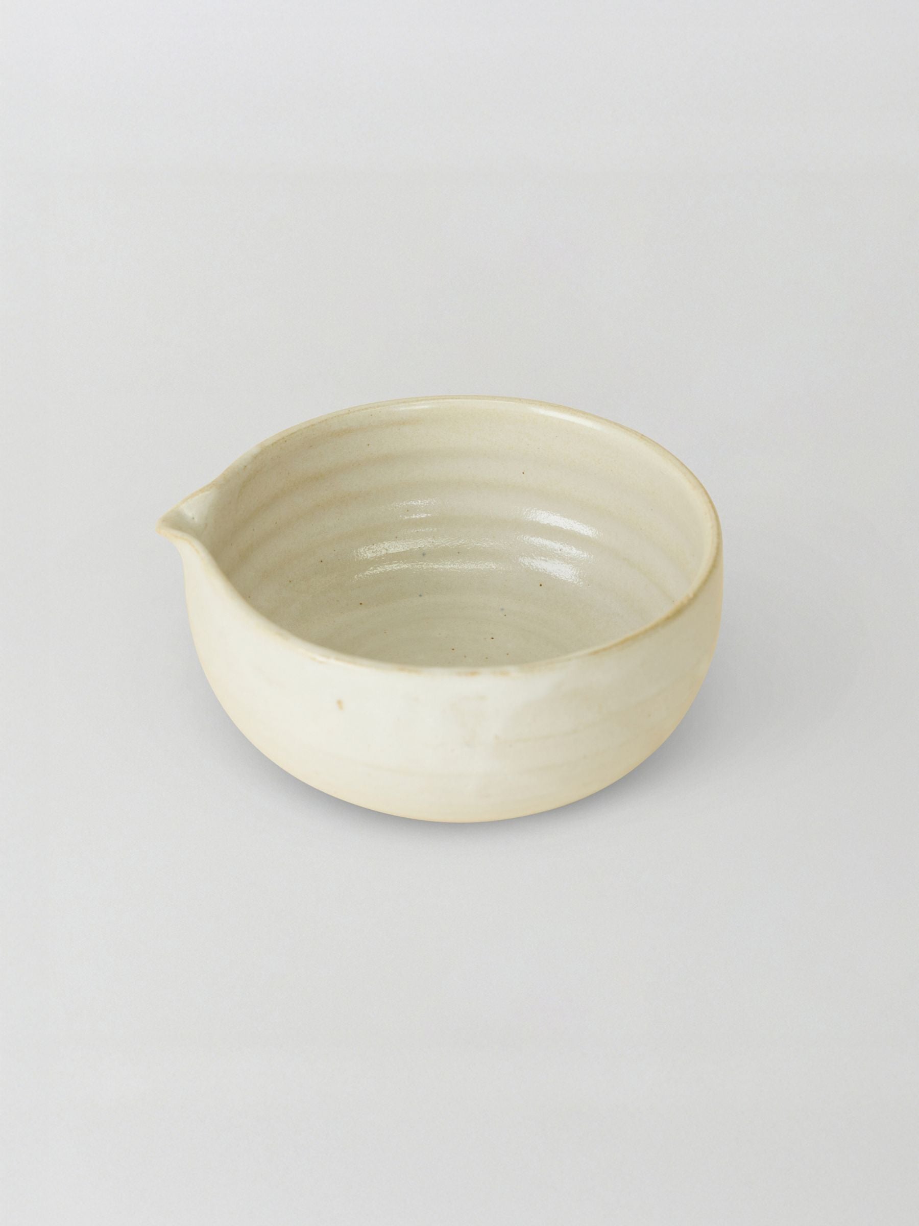 Ceramic matcha bowl on a light gray background