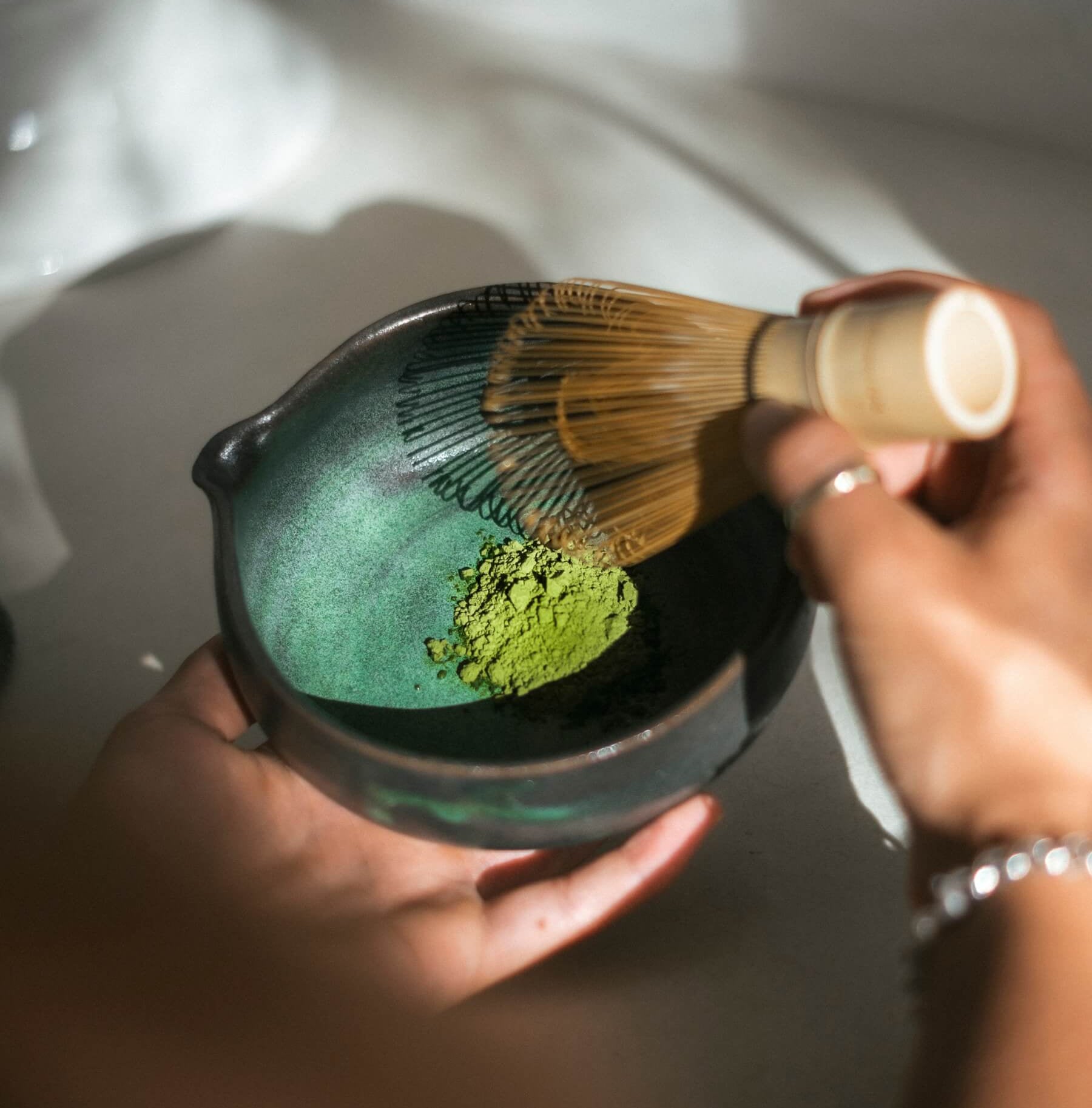 My Matcha Co. organic ceremonial matcha powder in a cereamic matcha bowl chawan