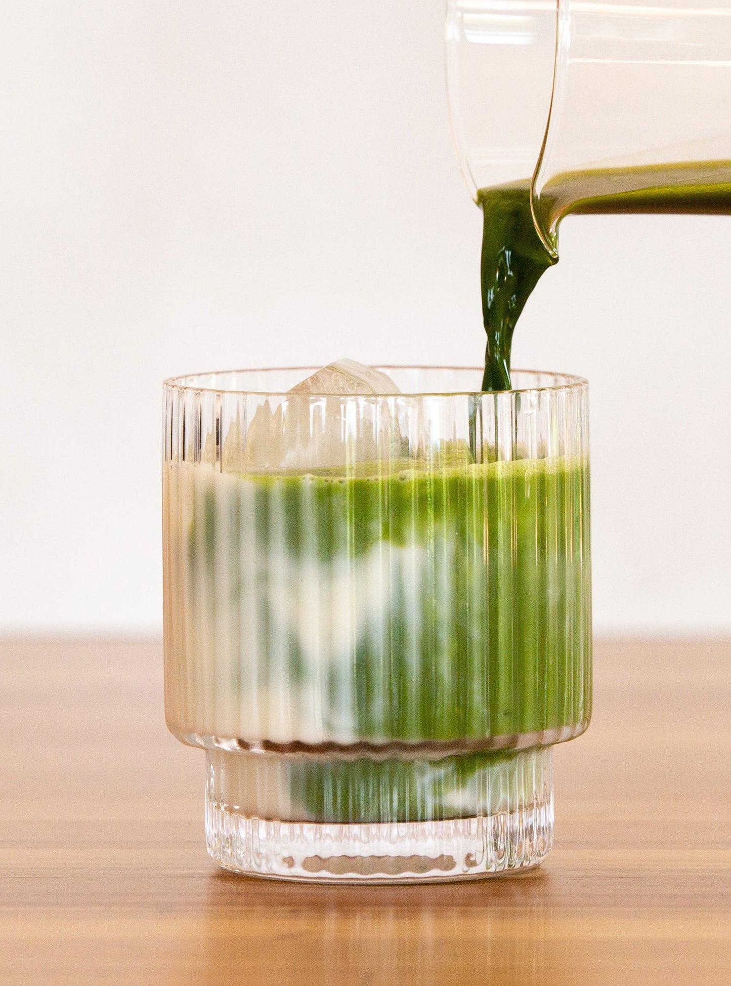 Organic  Matcha  Poured  In  Glass  With Milk - My Matcha Co.